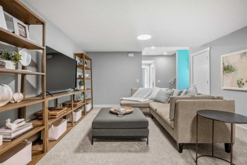 207 Huxland Path Ne, Calgary, AB - Indoor Photo Showing Living Room