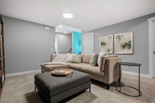 207 Huxland Path Ne, Calgary, AB - Indoor Photo Showing Living Room