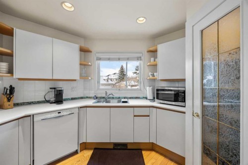 19 Hawkmount Heights Nw, Calgary, AB - Indoor Photo Showing Kitchen With Double Sink