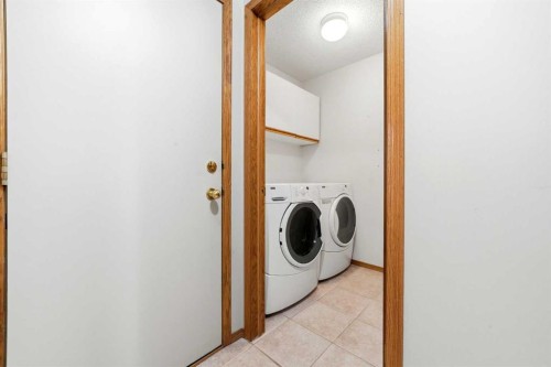 86 Suncanyon Park Se, Calgary, AB - Indoor Photo Showing Laundry Room