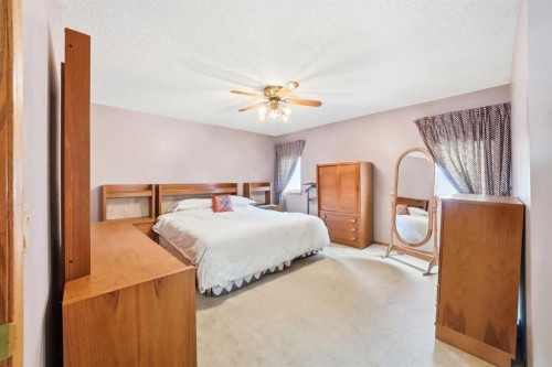 86 Suncanyon Park Se, Calgary, AB - Indoor Photo Showing Bedroom