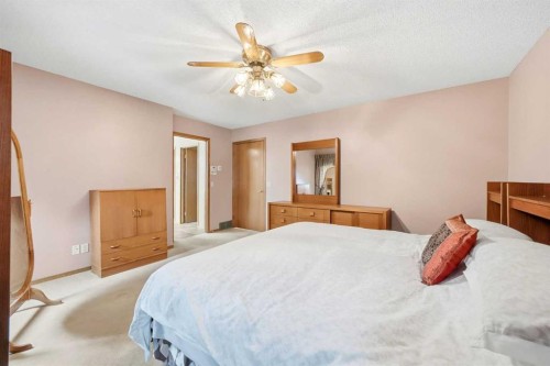 86 Suncanyon Park Se, Calgary, AB - Indoor Photo Showing Bedroom