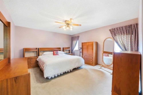 86 Suncanyon Park Se, Calgary, AB - Indoor Photo Showing Bedroom