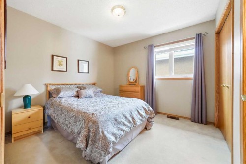 86 Suncanyon Park Se, Calgary, AB - Indoor Photo Showing Bedroom
