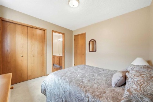 86 Suncanyon Park Se, Calgary, AB - Indoor Photo Showing Bedroom
