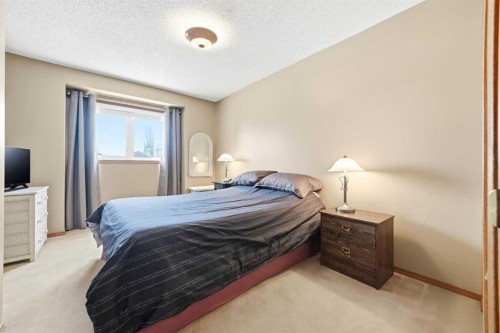 86 Suncanyon Park Se, Calgary, AB - Indoor Photo Showing Bedroom