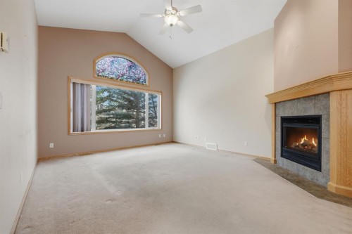 123 Kincora View Nw, Calgary, AB - Indoor Photo Showing Living Room With Fireplace