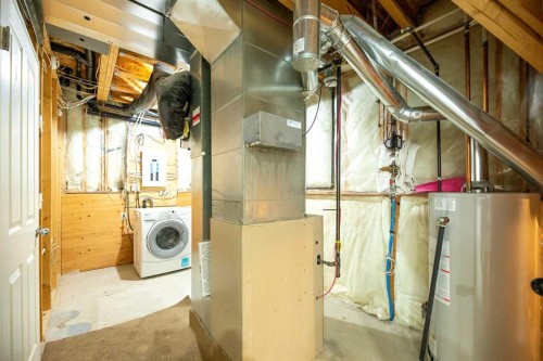 145 Covebrook Close Ne, Calgary, AB - Indoor Photo Showing Laundry Room