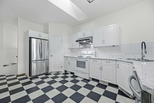 145 Covebrook Close Ne, Calgary, AB - Indoor Photo Showing Kitchen