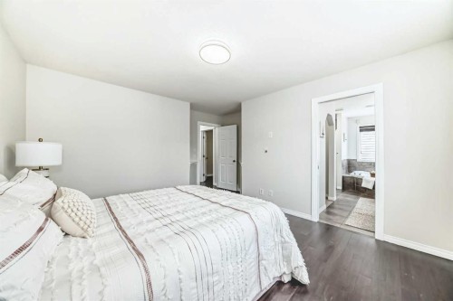 21 Panamount Row Nw, Calgary, AB - Indoor Photo Showing Bedroom