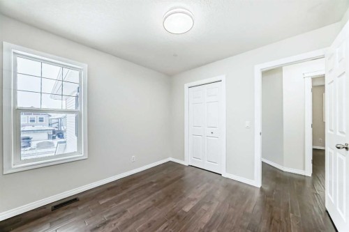 21 Panamount Row Nw, Calgary, AB - Indoor Photo Showing Other Room
