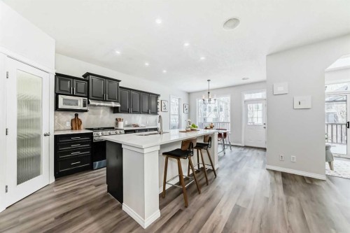 21 Panamount Row Nw, Calgary, AB - Indoor Photo Showing Kitchen With Upgraded Kitchen