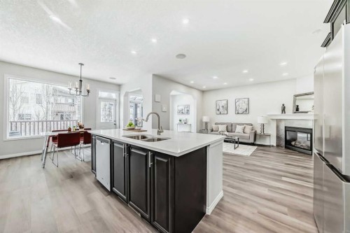 21 Panamount Row Nw, Calgary, AB - Indoor Photo Showing Kitchen With Double Sink With Upgraded Kitchen
