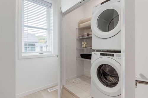 1469 Na'A Drive Sw, Calgary, AB - Indoor Photo Showing Laundry Room
