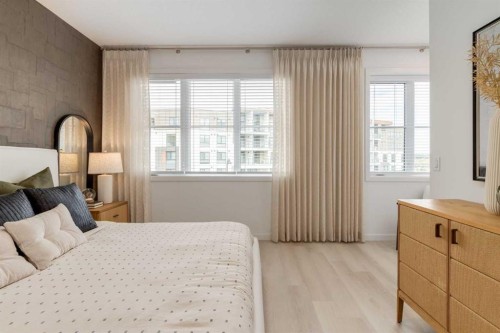 1469 Na'A Drive Sw, Calgary, AB - Indoor Photo Showing Bedroom