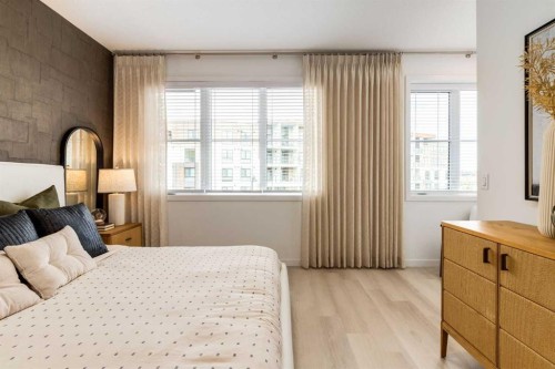 1469 Na'A Drive Sw, Calgary, AB - Indoor Photo Showing Bedroom