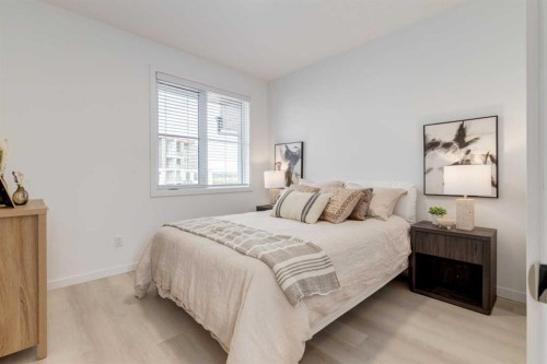 1469 Na'A Drive Sw, Calgary, AB - Indoor Photo Showing Bedroom