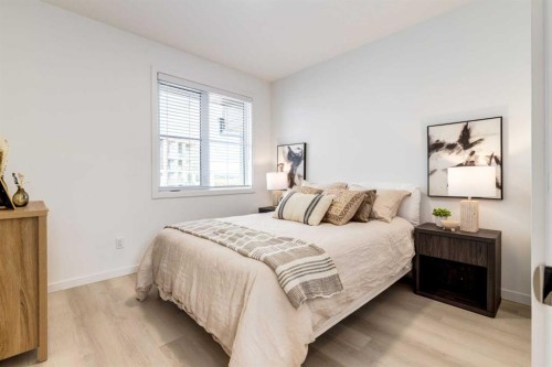 1469 Na'A Drive Sw, Calgary, AB - Indoor Photo Showing Bedroom