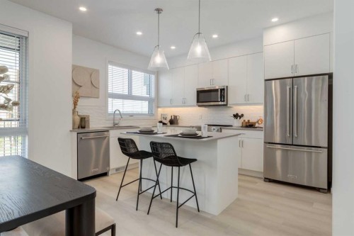 1469 Na'A Drive Sw, Calgary, AB - Indoor Photo Showing Kitchen With Stainless Steel Kitchen With Upgraded Kitchen
