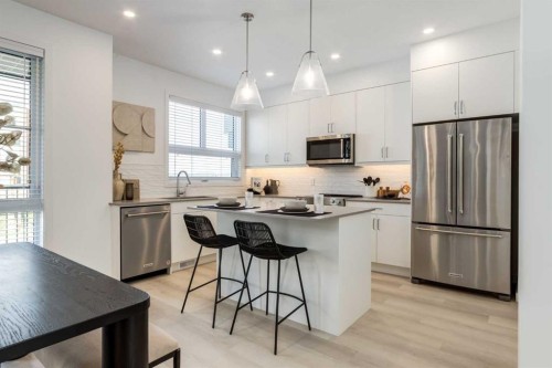 1469 Na'A Drive Sw, Calgary, AB - Indoor Photo Showing Kitchen With Stainless Steel Kitchen With Upgraded Kitchen