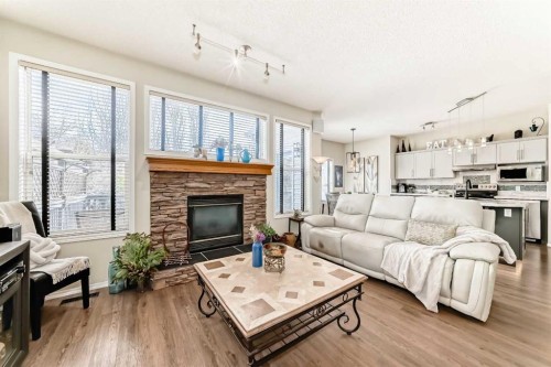 42 Somerset Circle Sw, Calgary, AB - Indoor Photo Showing Living Room With Fireplace