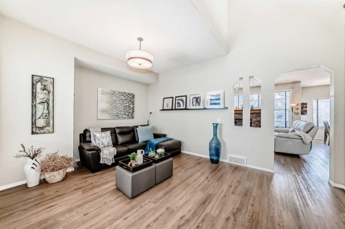 42 Somerset Circle Sw, Calgary, AB - Indoor Photo Showing Living Room