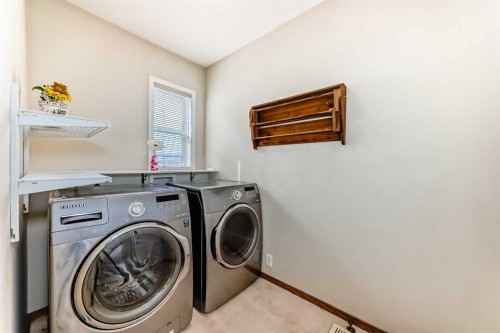 42 Somerset Circle Sw, Calgary, AB - Indoor Photo Showing Laundry Room