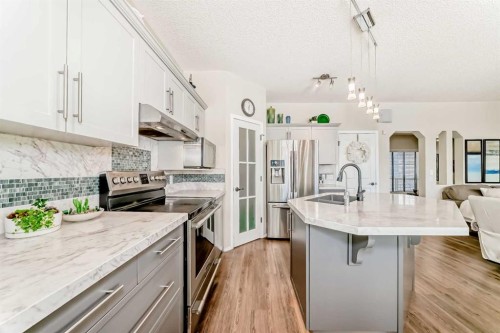 42 Somerset Circle Sw, Calgary, AB - Indoor Photo Showing Kitchen With Stainless Steel Kitchen With Upgraded Kitchen
