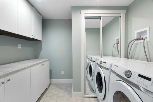 224 Silverview Way Nw, Calgary, AB - Indoor Photo Showing Laundry Room