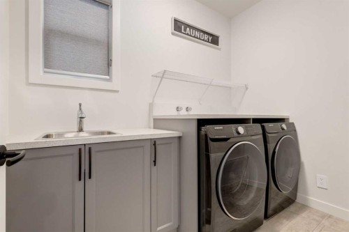 142 Cranbrook Park Se, Calgary, AB - Indoor Photo Showing Laundry Room