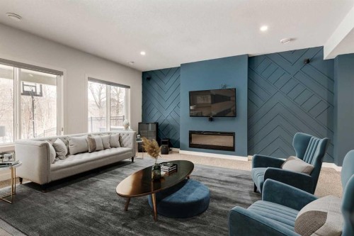 142 Cranbrook Park Se, Calgary, AB - Indoor Photo Showing Living Room With Fireplace