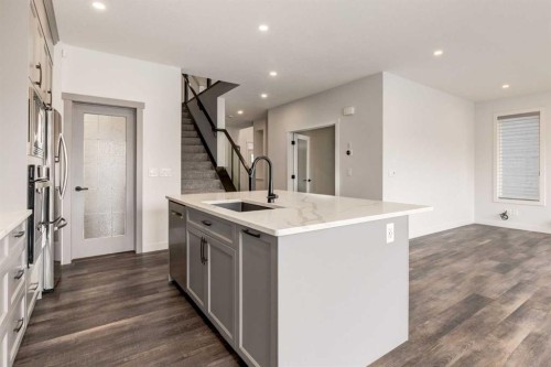 142 Cranbrook Park Se, Calgary, AB - Indoor Photo Showing Kitchen With Upgraded Kitchen