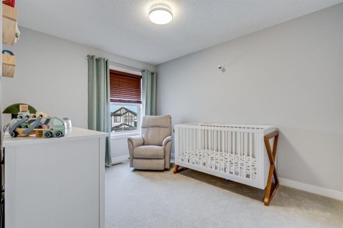 26 Auburn Glen Circle Se, Calgary, AB - Indoor Photo Showing Bedroom