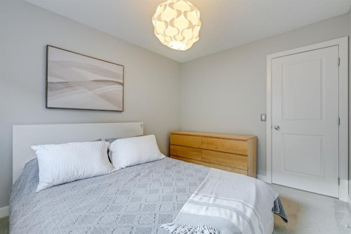 26 Auburn Glen Circle Se, Calgary, AB - Indoor Photo Showing Bedroom