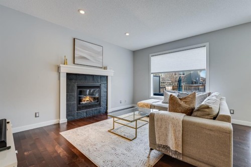 26 Auburn Glen Circle Se, Calgary, AB - Indoor Photo Showing Living Room With Fireplace