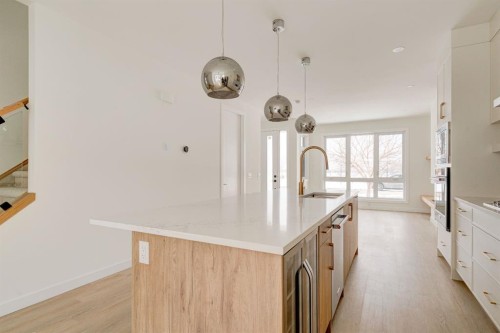 39A Moncton Road Ne, Calgary, AB - Indoor Photo Showing Kitchen With Upgraded Kitchen