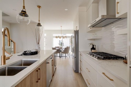 39A Moncton Road Ne, Calgary, AB - Indoor Photo Showing Kitchen With Double Sink With Upgraded Kitchen