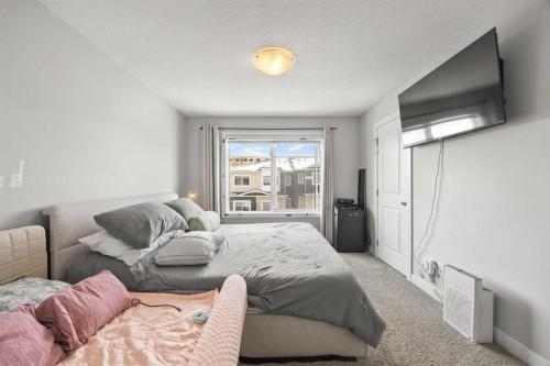 1320 Sage Hill Grove Nw, Calgary, AB - Indoor Photo Showing Bedroom