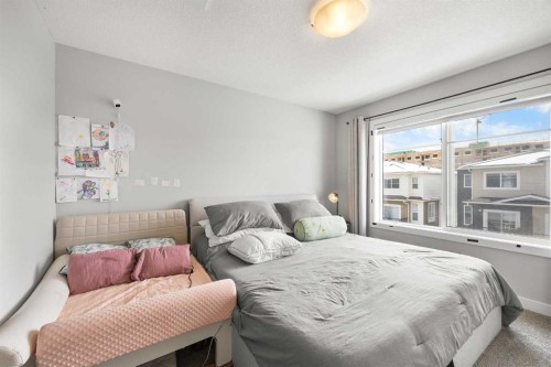 1320 Sage Hill Grove Nw, Calgary, AB - Indoor Photo Showing Bedroom