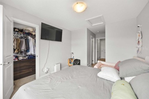 1320 Sage Hill Grove Nw, Calgary, AB - Indoor Photo Showing Bedroom