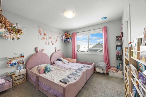 1320 Sage Hill Grove Nw, Calgary, AB - Indoor Photo Showing Bedroom
