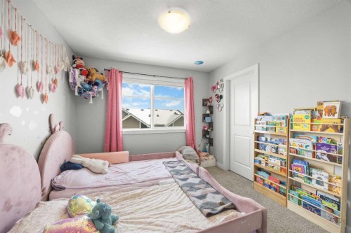 1320 Sage Hill Grove Nw, Calgary, AB - Indoor Photo Showing Bedroom