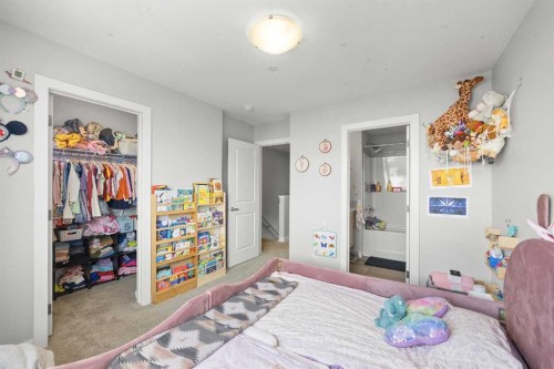 1320 Sage Hill Grove Nw, Calgary, AB - Indoor Photo Showing Bedroom