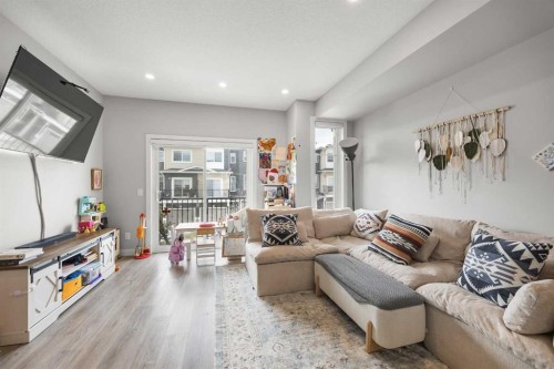 1320 Sage Hill Grove Nw, Calgary, AB - Indoor Photo Showing Living Room