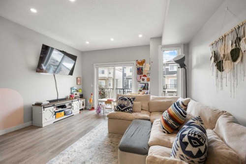 1320 Sage Hill Grove Nw, Calgary, AB - Indoor Photo Showing Living Room