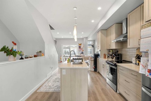 1320 Sage Hill Grove Nw, Calgary, AB - Indoor Photo Showing Kitchen With Stainless Steel Kitchen With Upgraded Kitchen