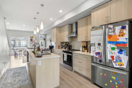 1320 Sage Hill Grove Nw, Calgary, AB - Indoor Photo Showing Kitchen With Stainless Steel Kitchen With Upgraded Kitchen