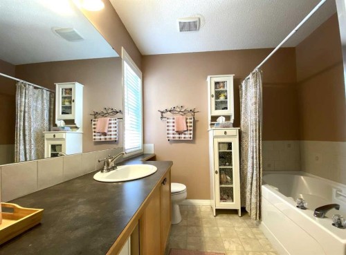 90 Tuscany Springs Heights Nw, Calgary, AB - Indoor Photo Showing Bathroom