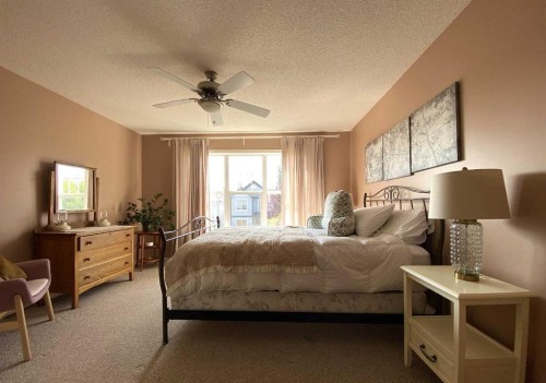 90 Tuscany Springs Heights Nw, Calgary, AB - Indoor Photo Showing Bedroom