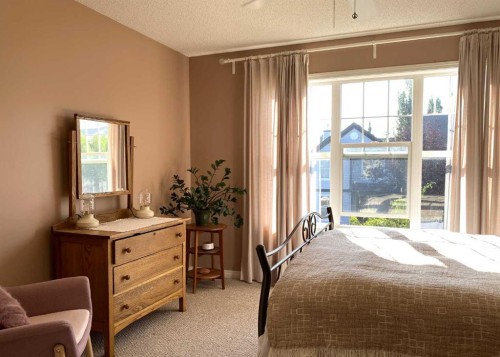 90 Tuscany Springs Heights Nw, Calgary, AB - Indoor Photo Showing Bedroom
